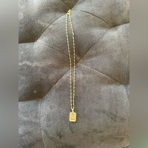 Uncommon James “M” Pendant Necklace